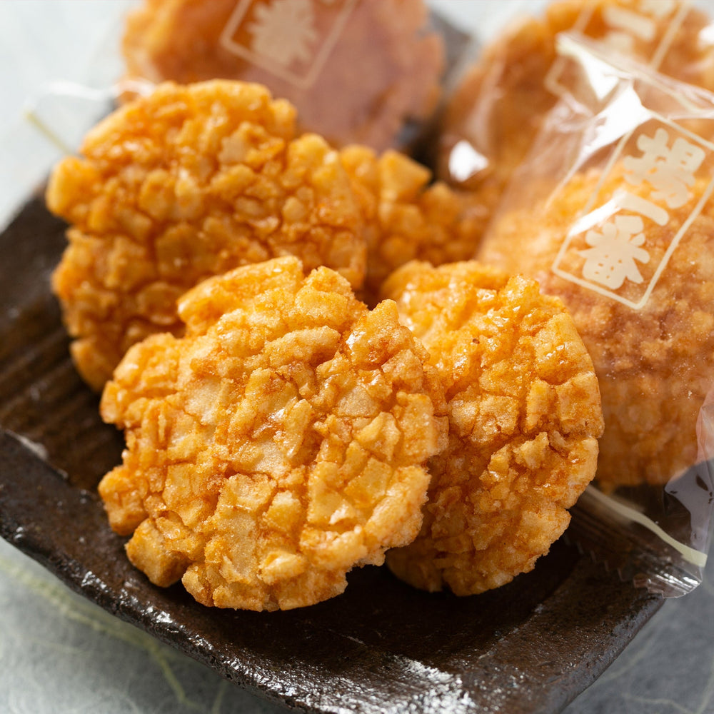 
                  
                    Crackers di Riso Fritti con Salsa di Soia e Miele (Ageichiban) - Kameda (138g). Dettagli del Cracker
                  
                