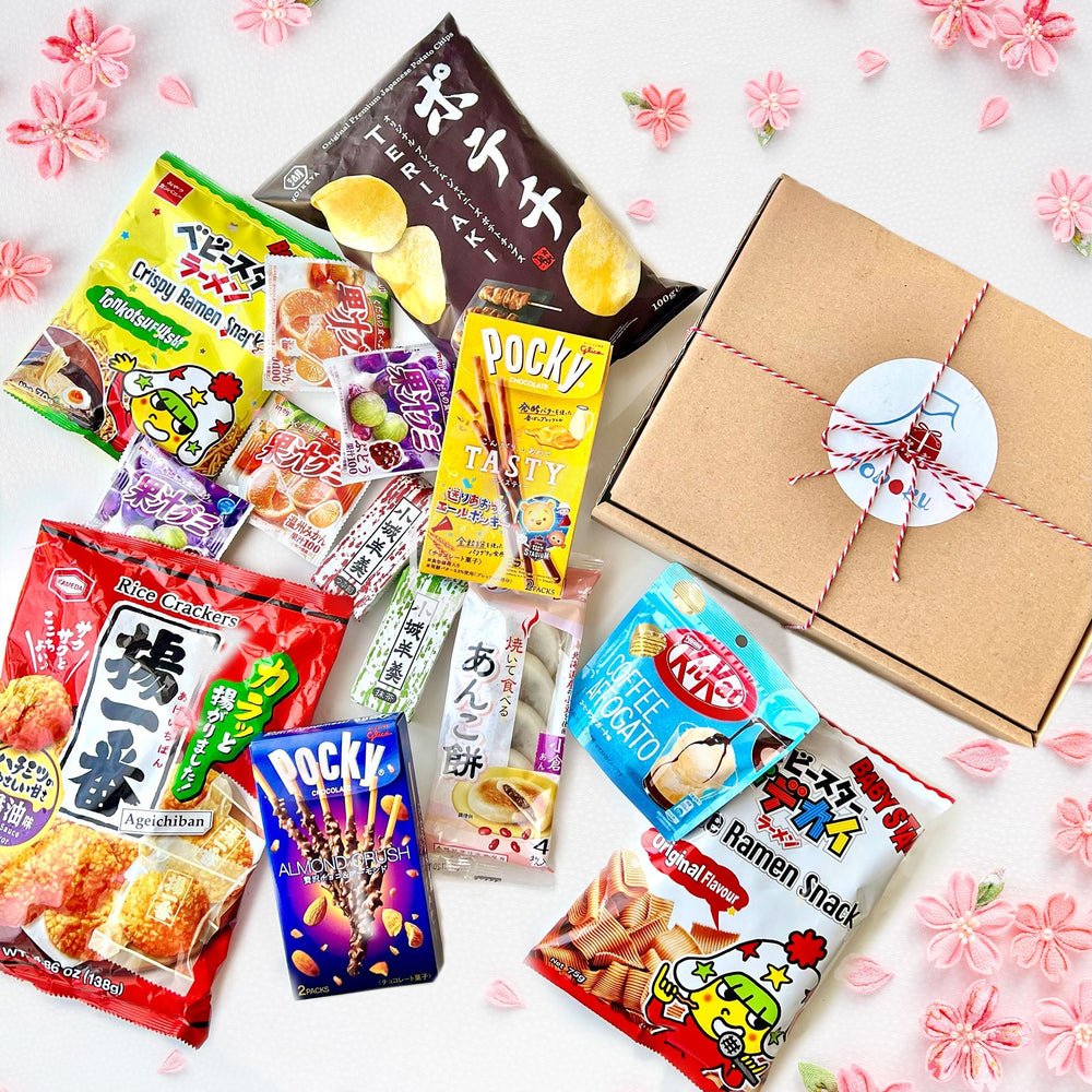 Box Selezione Dolci & Snack Salati Giapponesi | Todoku Japan. a tema hanami con fiori di ciliegio